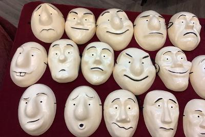 Blue Cabin art project heads